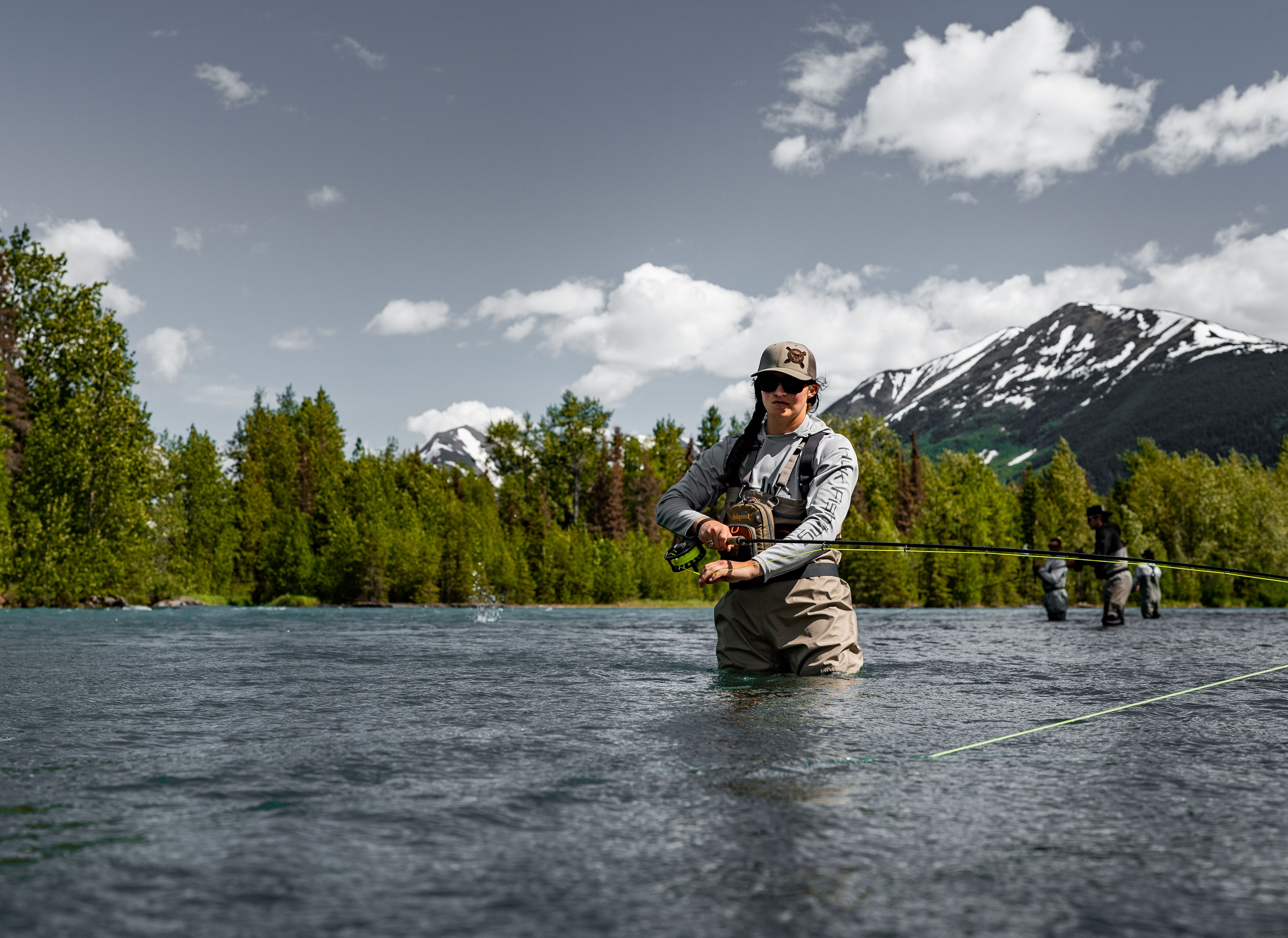 Woman veteran fly fishing in Alaska